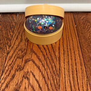 Glitter Smile Stress Ball in Yellow Tin